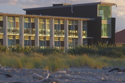 Exterior View with Beach - Beachfront Hotel