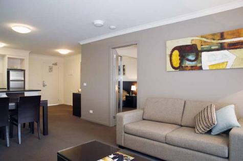 Spacious One Bedroom Apartment Living Area - Quest Sale