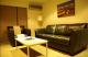 Living Room in One Bedroom Apartment
 - Alpha Motel Luxury Apartments