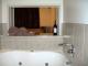 Relax in Spa Bath while you watch TV or a DVD
 - Alpine Lake Motor Lodge and Conference Centre