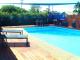 Pool and BBQ Area
 - Bali Hi Motel