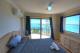 Top floor Deluxe bedroom great water views
 - Bayview Beach Holiday Apartments