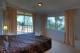 Deluxe bedroom with water views
 - Bayview Beach Holiday Apartments