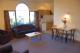 Deluxe Two Bedroom Spa-bath Apartment. Lounge showing kitchen area.
 - Comfort Christchurch Motel & Apartments