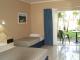 resort style rooms located around central swimming pool area
 - Hotel Tropiq