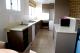 Kitchen
 - Coastal Comfort Motel