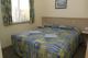Deluxe Ocean View Villa Master Bedroom
 - Discovery Parks - Pambula Beach