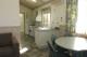Deluxe Ocean View Villa Living/Kitchen
 - Discovery Parks - Pambula Beach