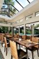 Poolside Breakfast Room
 - Emerald Inn on Takapuna Beach