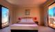 QUEEN BED MAIN ROOM 2 BEDROOM
 - Island Beach Resort