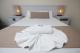 Queen Bedding
 - Island Palms Motor Inn