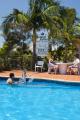 Playing by the pool
 - Island Palms Motor Inn
