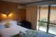 Queen Deluxe  with courtyard
 - Port O'Call Motel