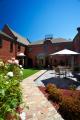 Relaxing central rose courtyard and BBQ area
 - Mercure Ballarat Mews Serviced Apartments