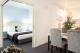 Adara Collins Dining and Bedroom
 - Collins Hotel Apartments