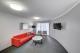 Living room
 - Adina Serviced Apartments Canberra James Court