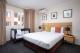 Bedroom with child cot
 - Aligned Corporate Residences Kew