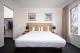 Three Bedroom Dining and Living Area
 - Aligned Corporate Residences Kew
