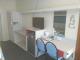 Interconnecting room seating area
 - Arkana Motel