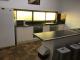 2 bedroom unit bedroom kitchen
 - Arkana Motel