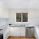 2 Bedroom Spa Villa Kitchen
 - Breakfree Aanuka Beach Resort
