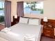 3 Bedroom Spa Queen Bedroom
 - Cable Beachside Villas