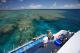 Snorkeller from back of vessel
 - Day Cruise to Great Barrier Reef - Snorkeller w/ Transfers Calypso Snorkel & Dive