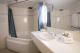 One Bedroom Spa Suite bathroom  - Madison Capital Executive Apartments