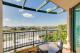 a balcony view of river
 - Central Cosmo Apartments