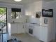 Self Contained Spa Apartment Kitchen  - Charm City Motel Bundaberg