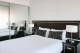 Bedroom
 - Chifley Apartments Newcastle