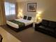 Queen Room
 - The Palms Motel