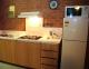 Kitchen in apartment
 - Perth Central City Stay Apartment Hotel