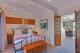 Pacific Suite Bedroom with spa on deck
 - Clubyamba Beach Holiday Accommodation