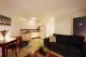 Living area - 1 bedroom apartment
 - Coffee House Apartment Motel