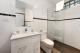 Premium room bathroom
 - Commodore Regent Hotel