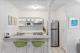 Fully self-contained kitchen
 - Coral Beach Noosa Resort