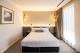 City Facing Suite Bedroom
 - Duxton Hotel Perth