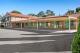Under cover carport for Standard Motel Rooms.
 - Econo Lodge Alabaster Motel