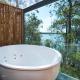Deluxe Cottage - Cormorant Spa Bath on Verandah
 - Eumarella Shores Noosa Lake Retreat