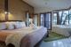 Luxury Lakehouse - Gooloowaa main bedroom
 - Eumarella Shores Noosa Lake Retreat