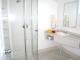 Bathroom
 - Burnt Pine Boutique Apartments