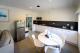 Kitchen
 - Georges Bay Apartments