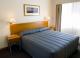 Executive king bed
 - Governor's Lodge Resort Hotel
