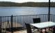 Balcony
 - De Lago Resort Lake Bennett