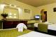 Bedroom
 - Lamplighter Motel