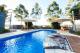 Pool area
 - Majestic Oasis Apartments