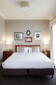 Bedroom
 - Majestic Old Lion Apartment