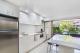2 Bedroom Deluxe Poolside Apartment kitchen
 - Mantra French Quarter Noosa