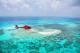 Flying over Sand Cay  - Vlasoff Sand Cay Getaway Nautilus Aviation